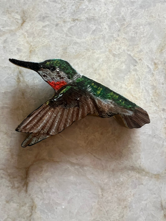 Hummingbird hovering (male)